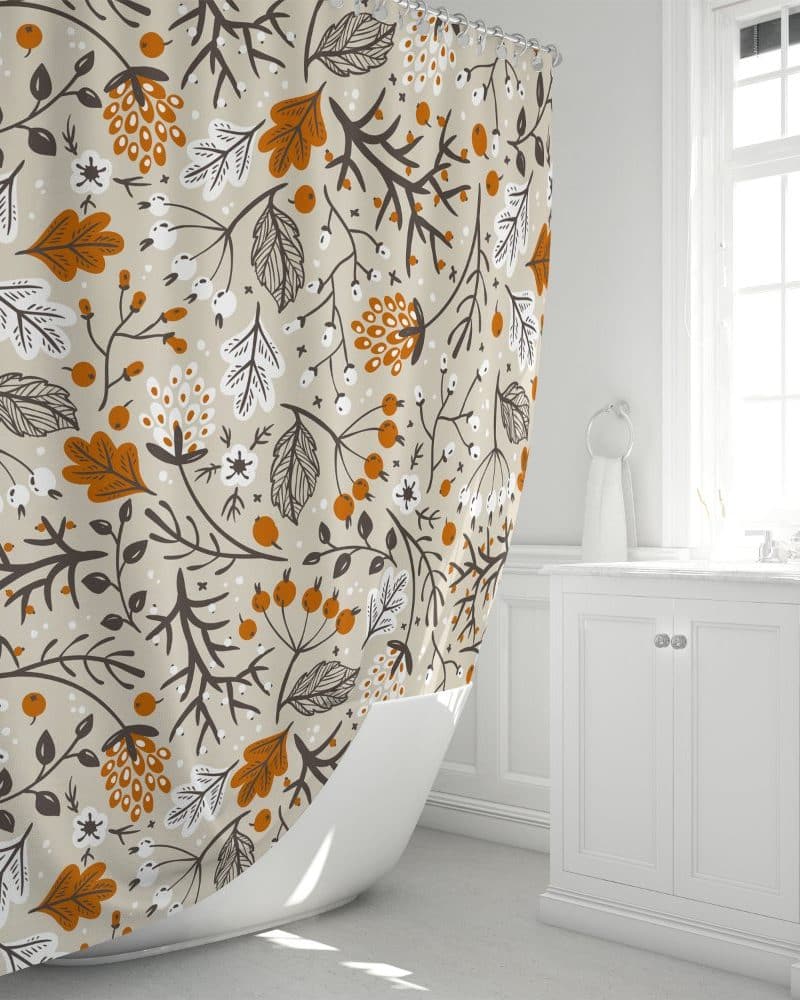 Beige shower curtain with a repeating pattern of stylized orange and brown leaves and berries.