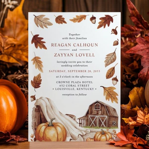 Fall-Themed Wedding Invitation For Reagan Calhoun And Zayyan Lovell, Featuring A Barn And Pumpkins.