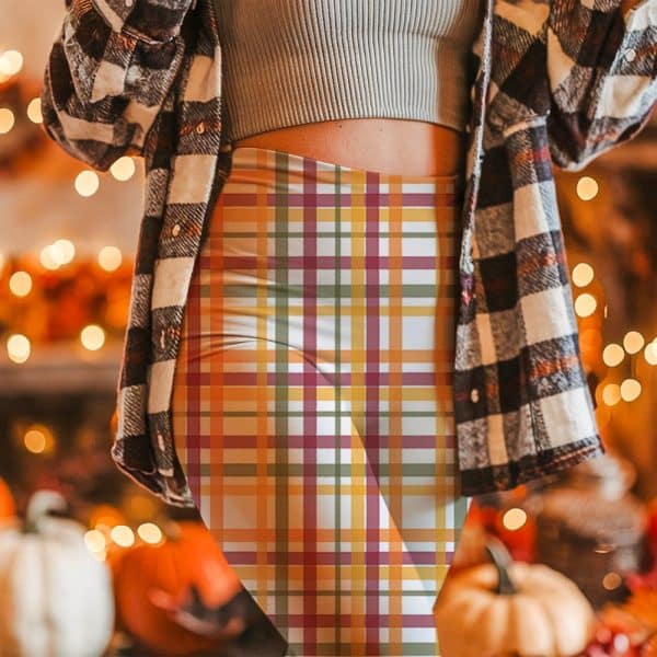 Woman Wearing Fall-Colored Plaid Leggings.