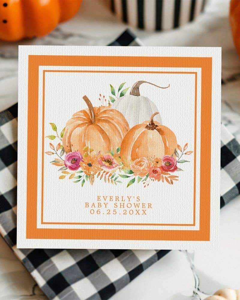 Baby shower invitation featuring watercolor pumpkins and flowers.