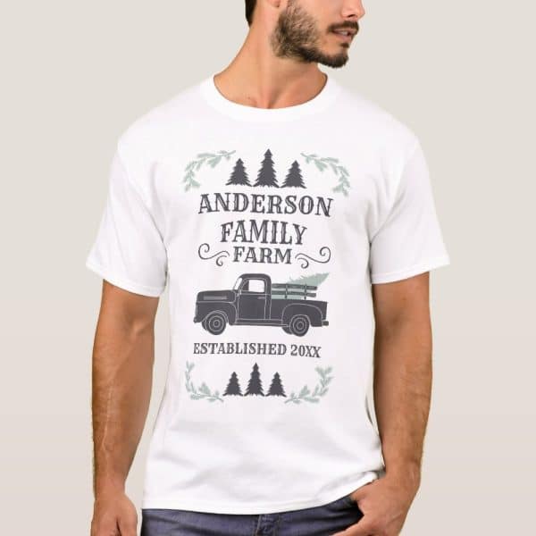 White T-Shirt With Anderson Family Farm Design; Features A Vintage Truck Carrying A Christmas Tree.