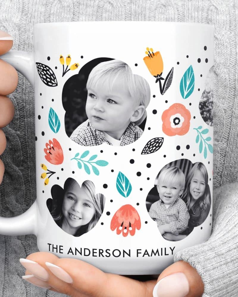 White coffee mug featuring black and white family photos surrounded by a floral design. The Andersons family name is printed at the bottom.