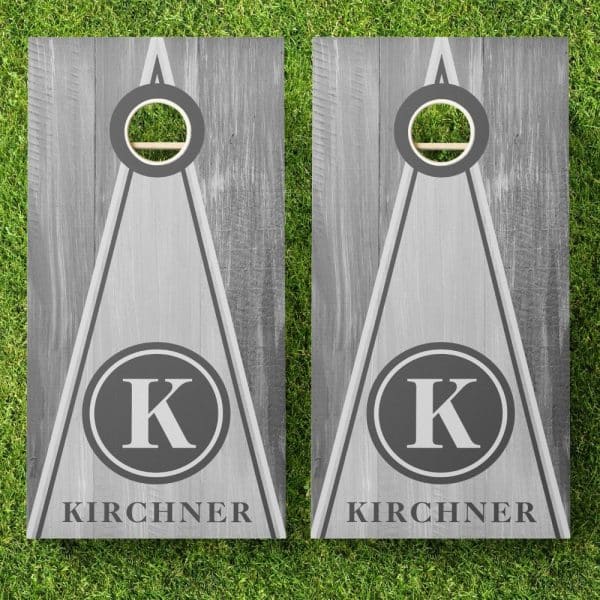 Pair Of Gray Personalized Cornhole Boards With The Initial K And The Last Name Kirchner.