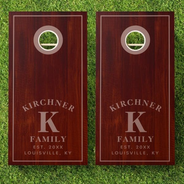 Pair Of Dark Brown Personalized Cornhole Boards With The Kirchner Family Name, Initial K, And Establishment Year.