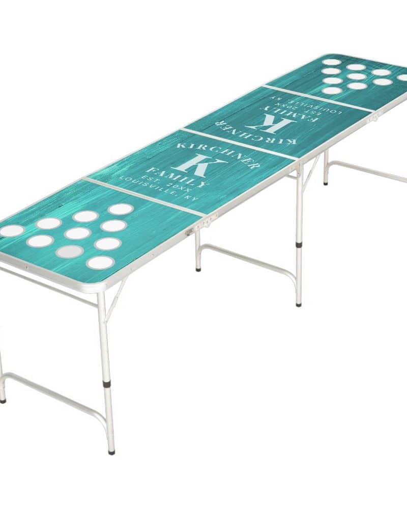 Teal and white personalized cornhole table.