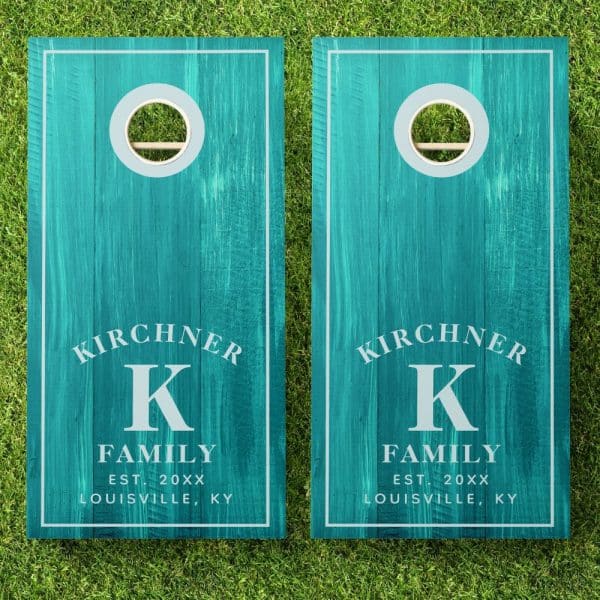 Pair Of Teal Cornhole Boards With The Kirchner Family Name, Initial K, And Establishment Year.