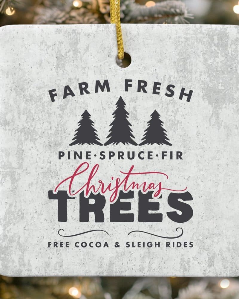 Square Christmas tree ornament with text reading Farm Fresh Pine Spruce Fir Christmas Trees and Free Cocoa & Sleigh Rides.