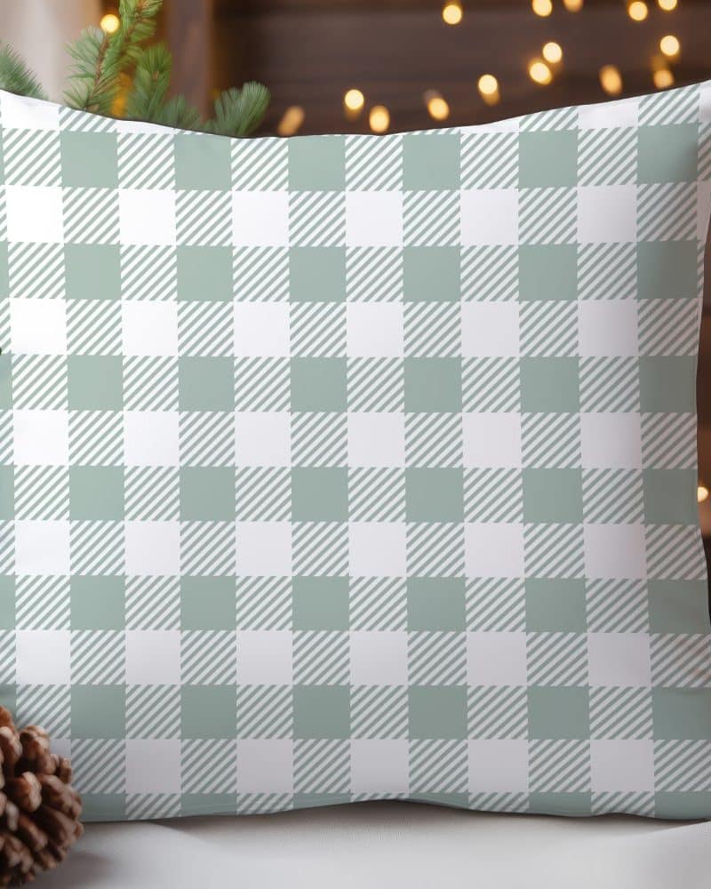 Sage green and white buffalo plaid throw pillow.