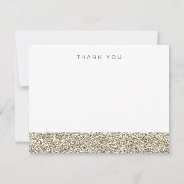 White Thank You Note With A Gold Glitter Bottom Border.