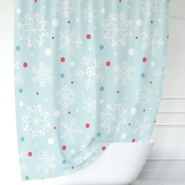 Light Blue Shower Curtain With A Snowflake And Polka Dot Pattern.