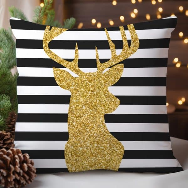 Gold Glitter Reindeer Silhouette On Black And White Striped Pillow.