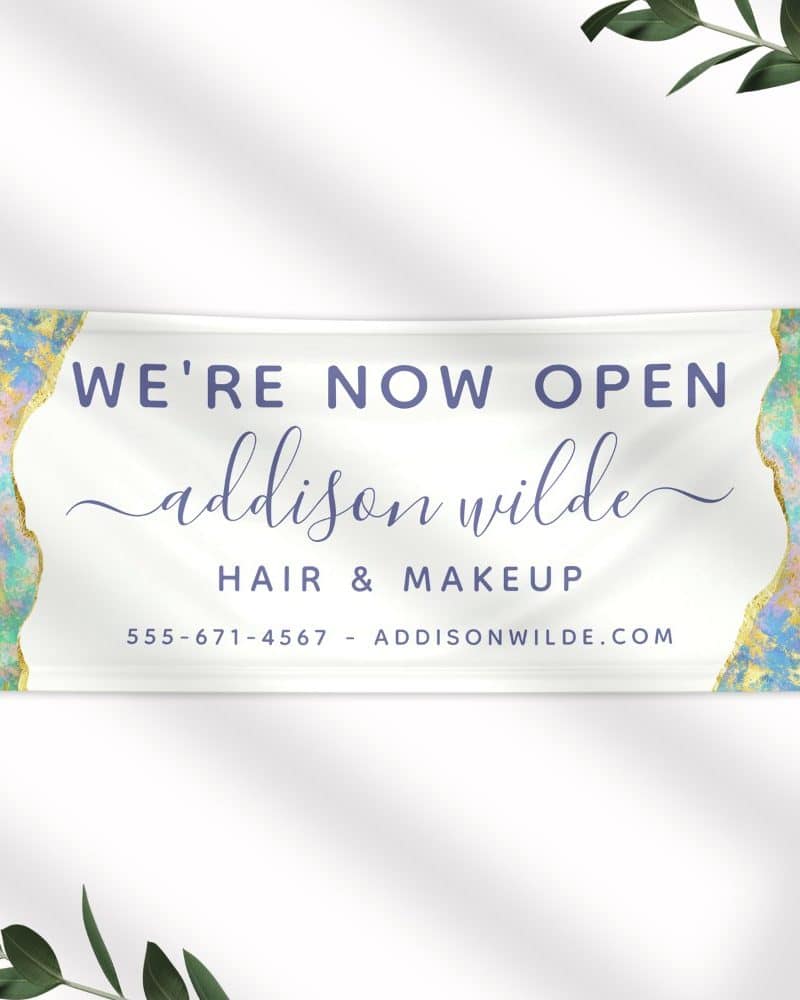 Grand opening banner for Addison Wilde Hair & Makeup. The banner features a pastel and gold design.