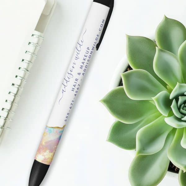 A Pen With A Pastel Marble Design And Addison Wilde'S Hair And Makeup Business Information Printed On It.