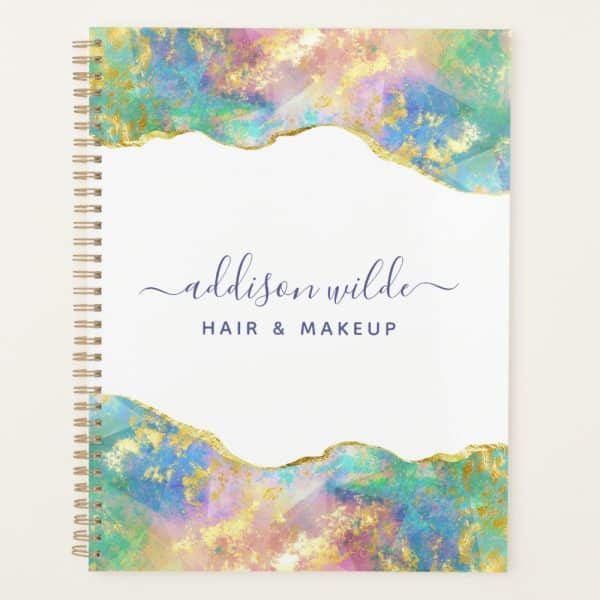 Spiral-Bound Notebook With A Pastel And Gold Abstract Design And Addison Wilde Hair &Amp; Makeup Written On The Cover.