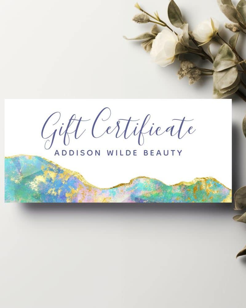 Gift certificate for Addison Wilde Beauty. The design features a pastel and gold abstract watercolor bottom border.