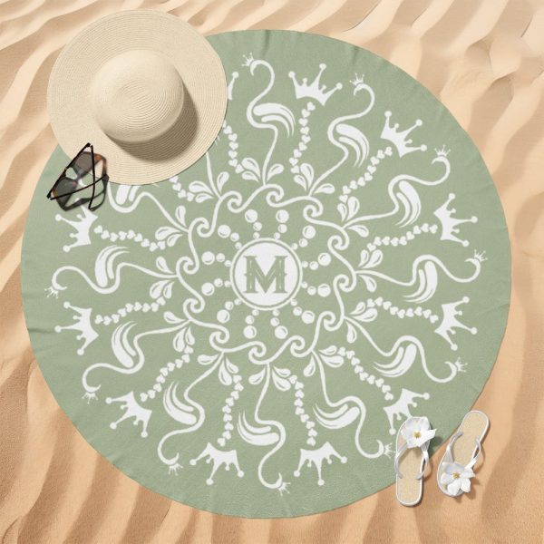 Sage Green Round Beach Towel With A White Mandala Design Featuring Crowns And An Initial M In The Center.