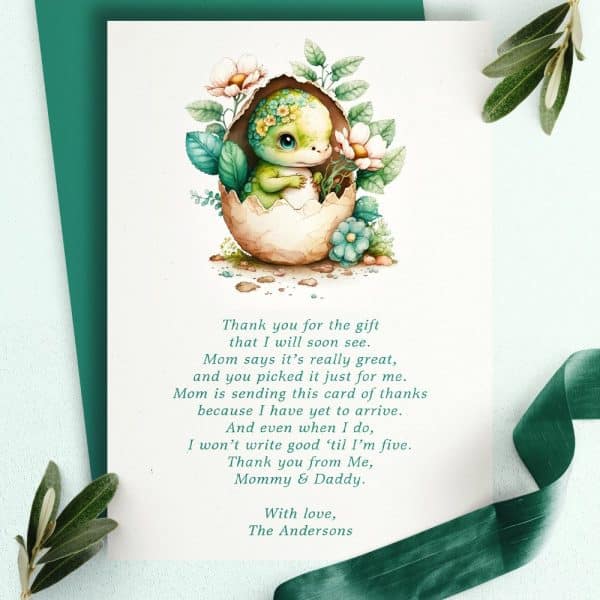 A Baby Dinosaur Hatching From An Egg Surrounded By Flowers On A Thank You Card.