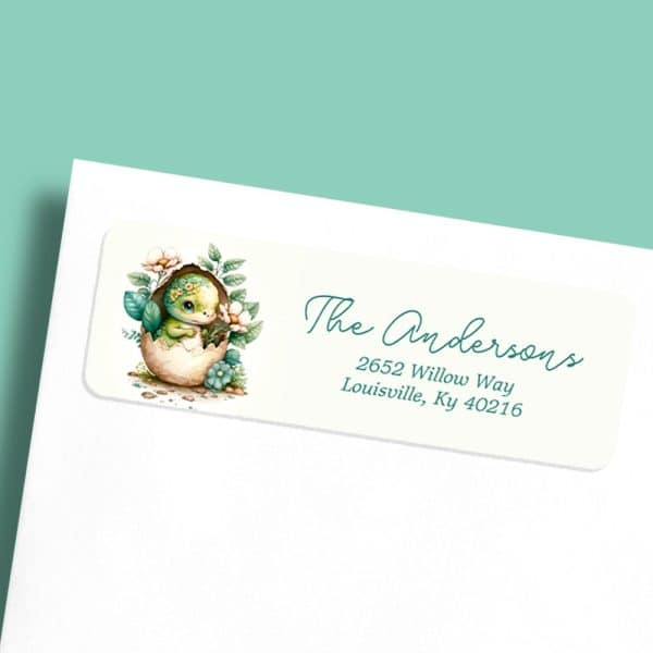 Return Address Label Featuring A Baby Dinosaur Hatching From An Egg Surrounded By Flowers.