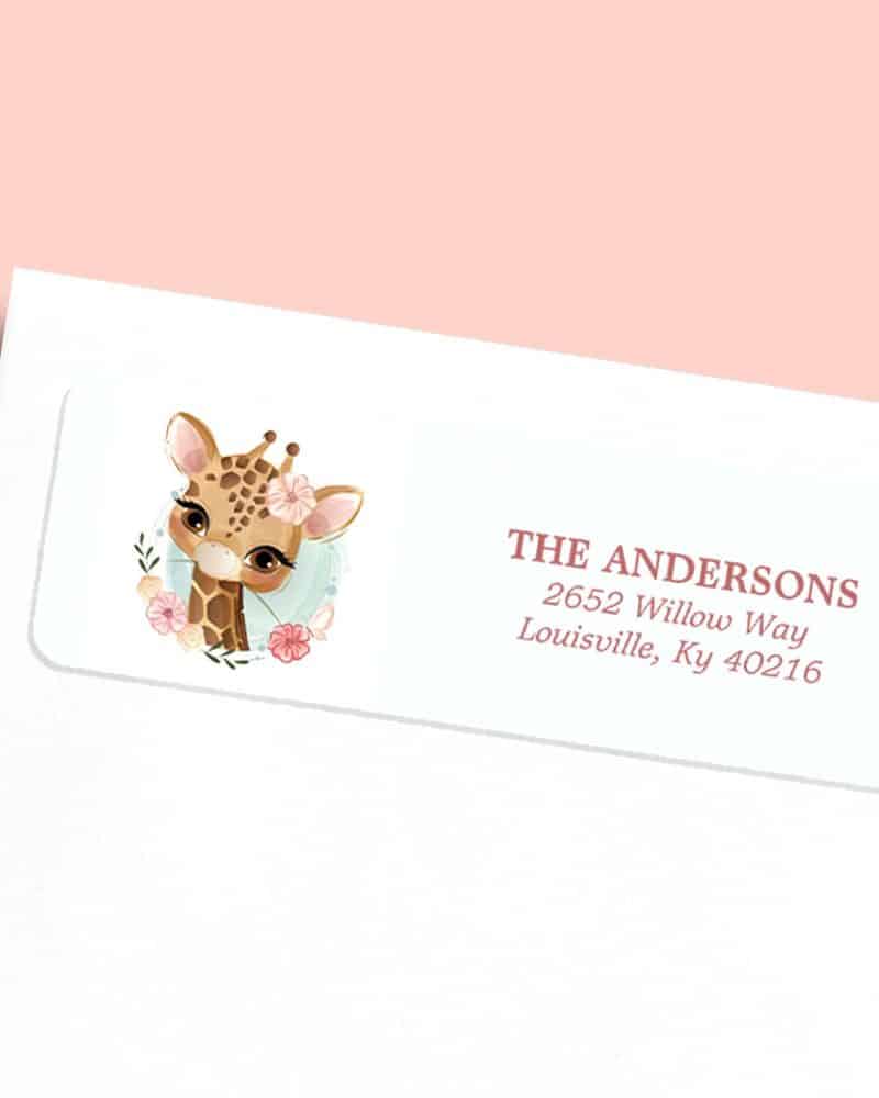 Return address label featuring a cute cartoon giraffe surrounded by flowers.