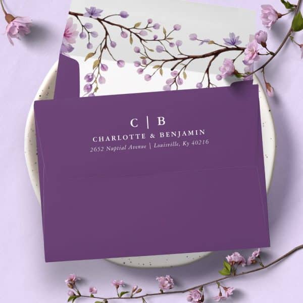 Purple Wedding Invitation Envelope With A Watercolor Floral Liner And The Names Charlotte &Amp; Benjamin And Their Address Printed On The Front.