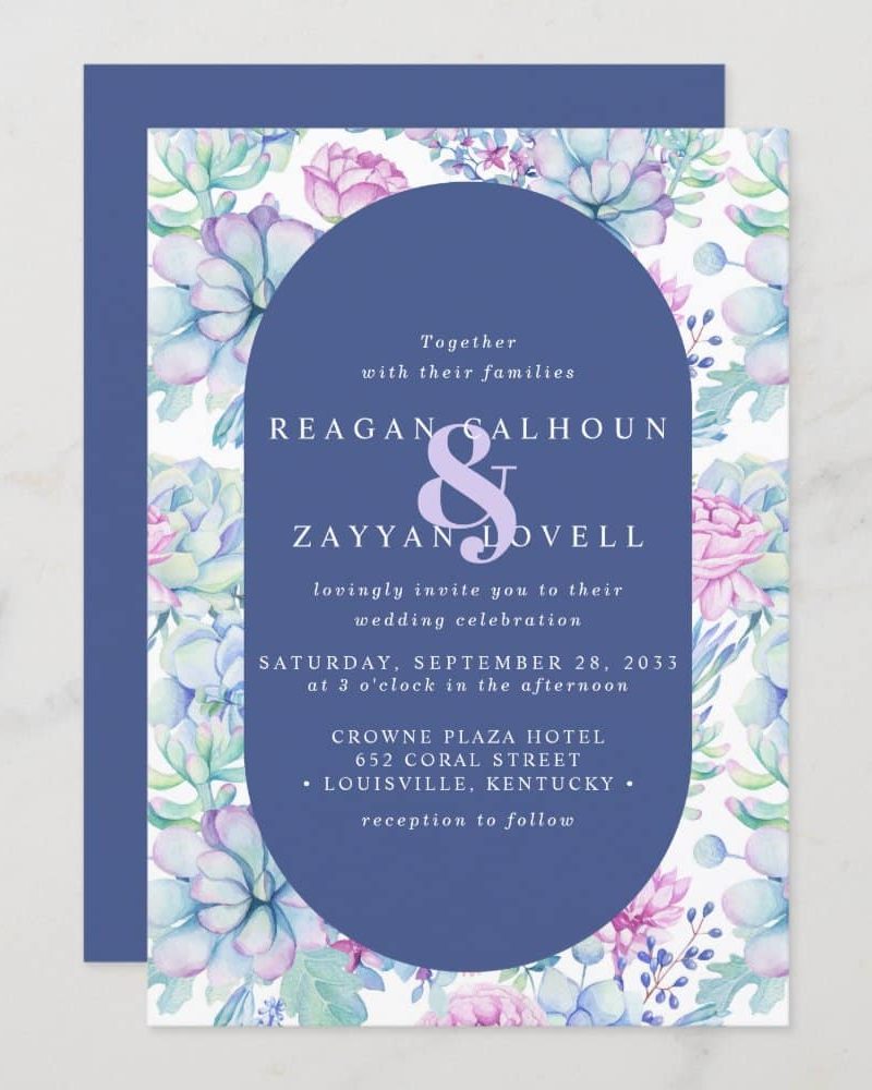 Wedding invitation with watercolor succulents and flowers; Reagan Calhoun and Zayyan Lovell's names and wedding details are featured on a navy blue oval.