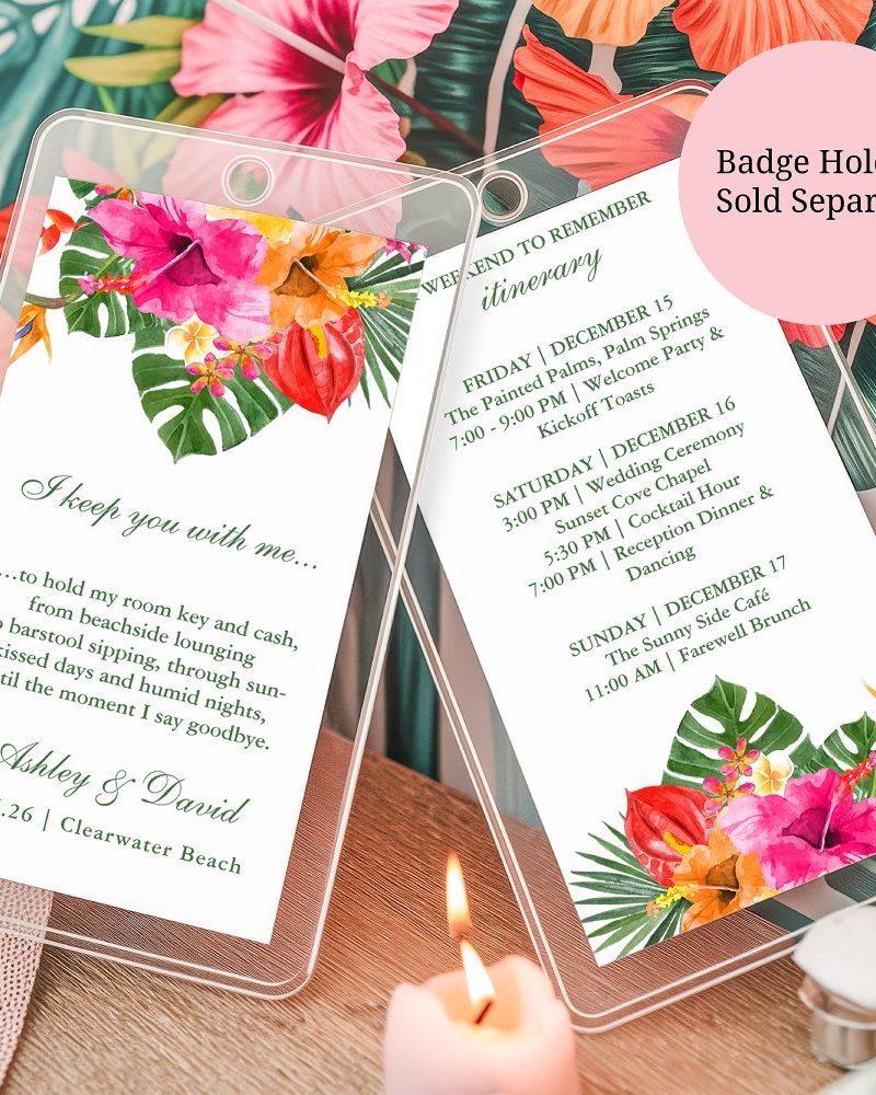 Tropical floral wedding itinerary card with the couple's names and wedding date.