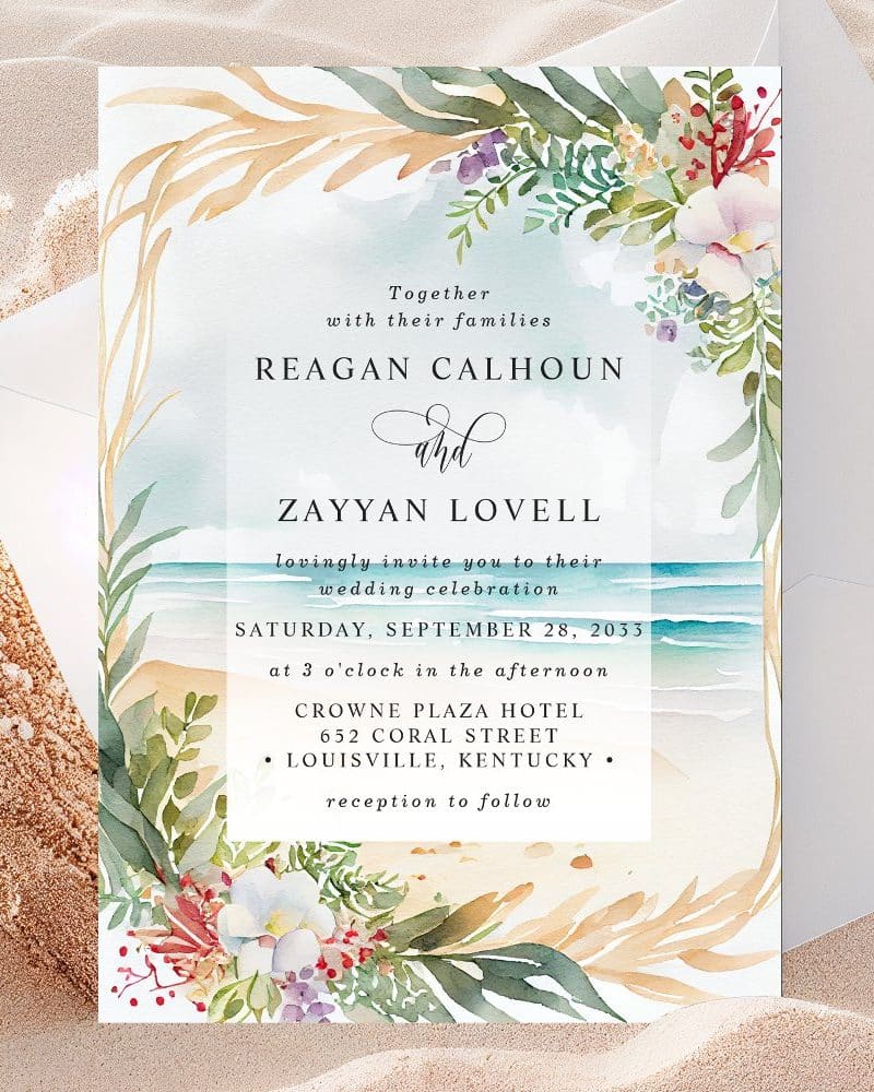 Wedding invitation for Reagan Calhoun and Zayyan Lovell, featuring a beach scene and floral watercolor design.
