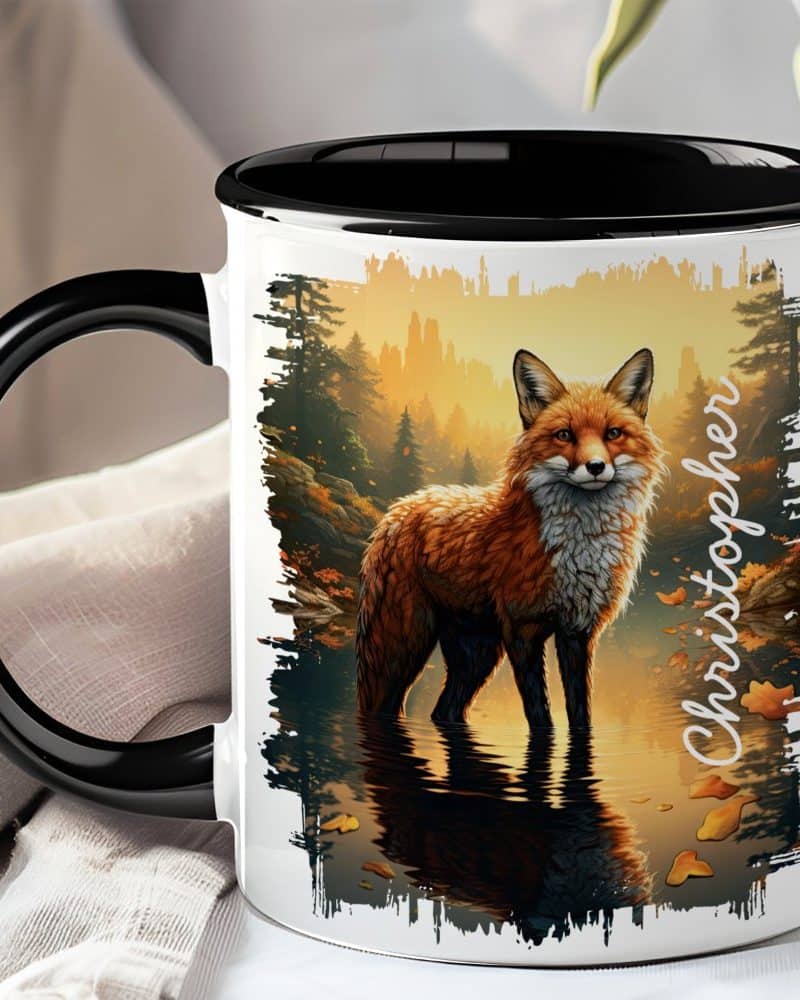 Black-handled mug featuring a red fox standing in a calm body of water at sunset, with the name Christopher printed on the side.