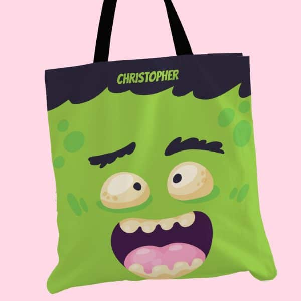 Green Monster Face Tote Bag With The Name Christopher.