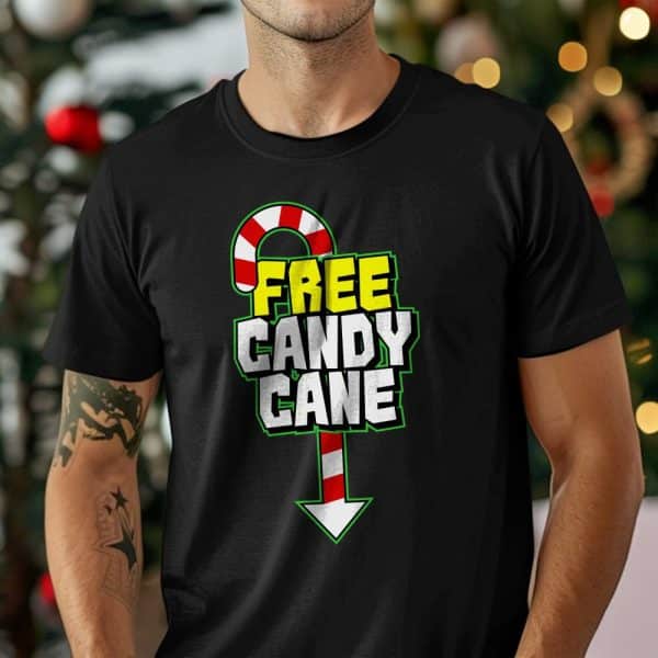 Person Wearing A Black T-Shirt With A Graphic Design Featuring A Candy Cane And The Text Free Candy Cane.