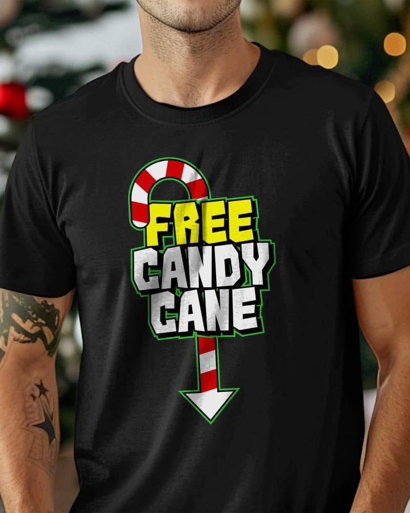 Person wearing a black t-shirt with a graphic design featuring a candy cane and the text Free Candy Cane.