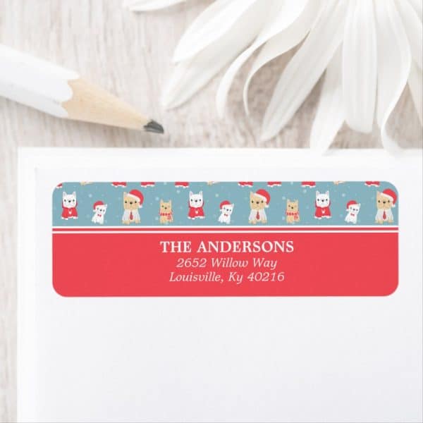 Christmas Return Address Label With A Pattern Of Dogs Wearing Santa Hats. The Andersons' Address Is Printed Below.