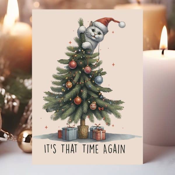 Christmas Card Featuring A White Cat Wearing A Santa Hat Perched On A Decorated Christmas Tree. The Text &Quot;It'S That Time Again&Quot; Is Below.