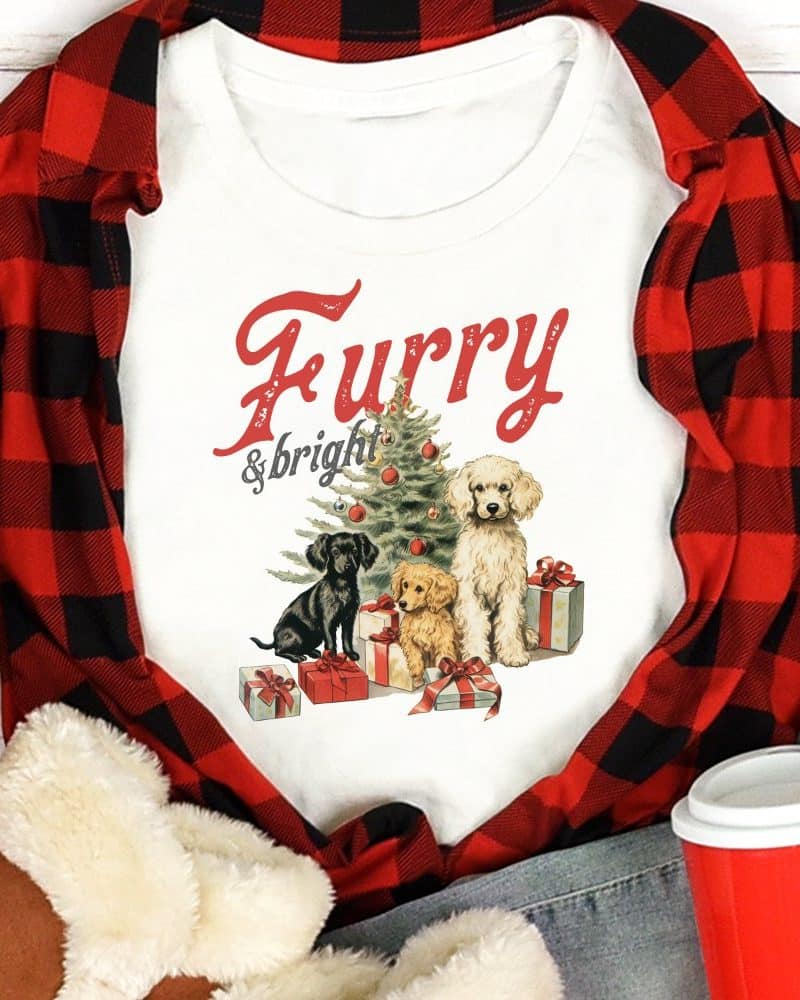White shirt with three dogs and a Christmas tree, text reading Furry & Bright.
