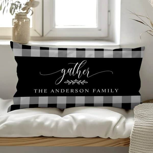 Black And Gray Buffalo Plaid Rectangular Pillow With The Word Gather And The Anderson Family Name.
