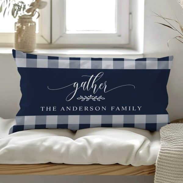 Navy Blue And Gray Gingham Throw Pillow With The Word Gather And The Anderson Family In White Script.