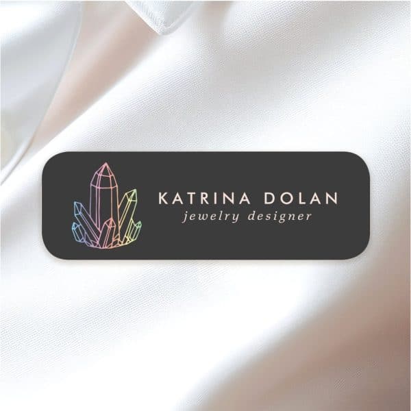 Katrina Dolan Jewelry Designer Logo Featuring Pastel Colored Crystals.