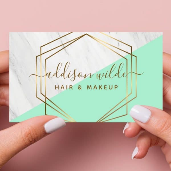 Business Card For Addison Wilde Hair &Amp; Makeup. The Card Features A Mint Green And Marble Design With Gold Geometric Accents.