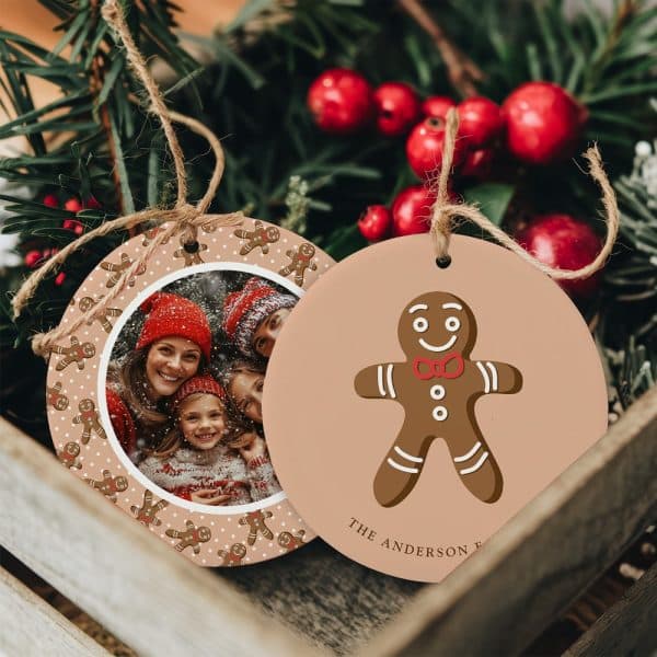 Two Round Christmas Ornaments. One Features A Family Photo Surrounded By Gingerbread Men. The Other Shows A Single Gingerbread Man.