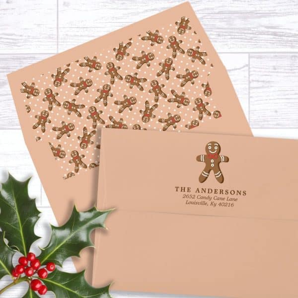 A Peach-Colored Envelope With A Gingerbread Man Design And Return Address.