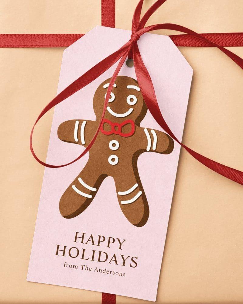 Gift tag with a gingerbread man illustration, Happy Holidays message, and The Andersons' name.