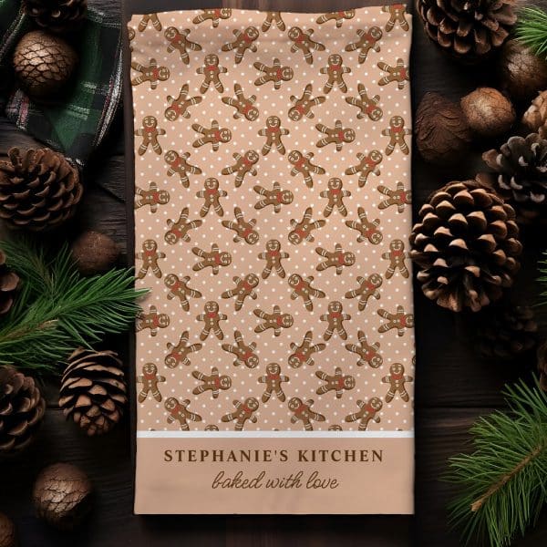 Kitchen Towel With A Pattern Of Gingerbread Men And The Text Stephanie'S Kitchen Baked With Love.