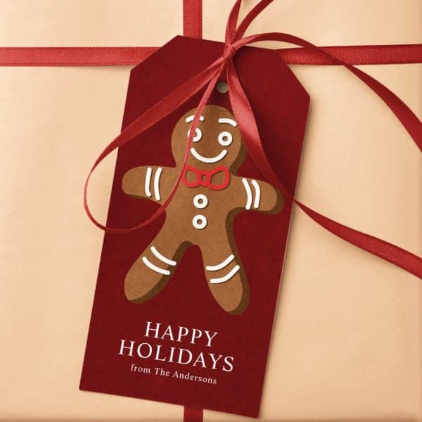 A Red Gift Tag With A Gingerbread Man And The Words Happy Holidays From The Andersons.
