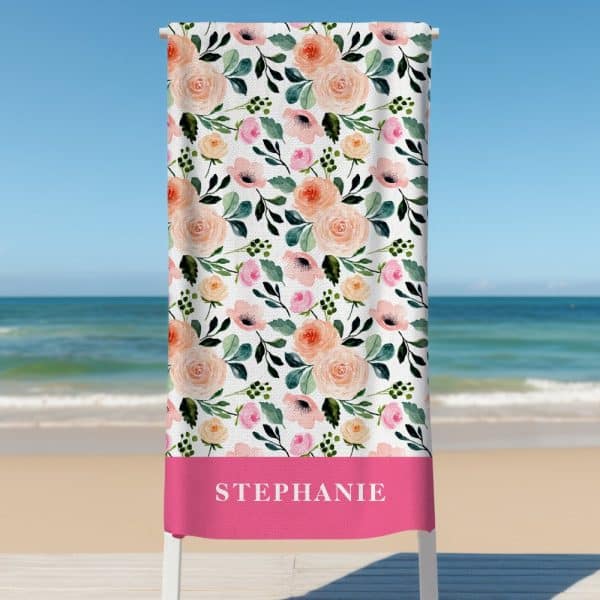 Personalized Beach Towel With A Floral Pattern And The Name Stephanie.