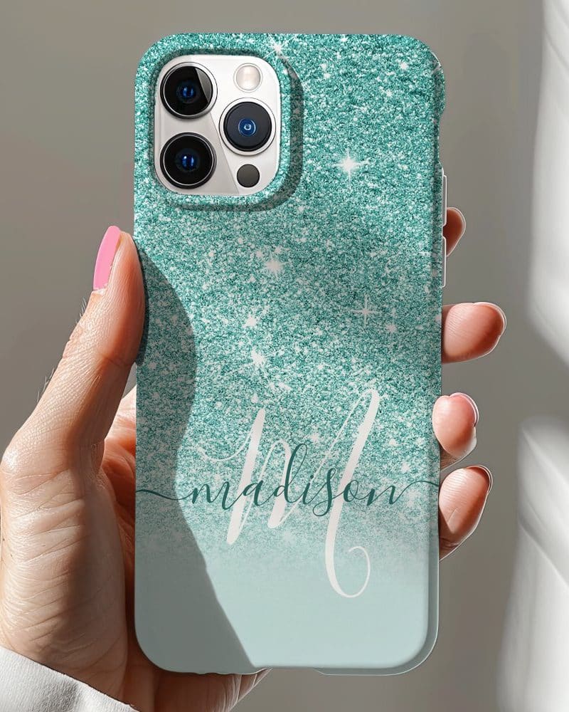Teal glitter iPhone case with the name Madison in white script.