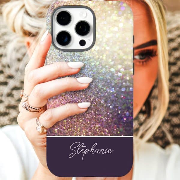 A Woman'S Hand Holding Up A Sparkly Iridescent Phone Case With The Name Stephanie On It.