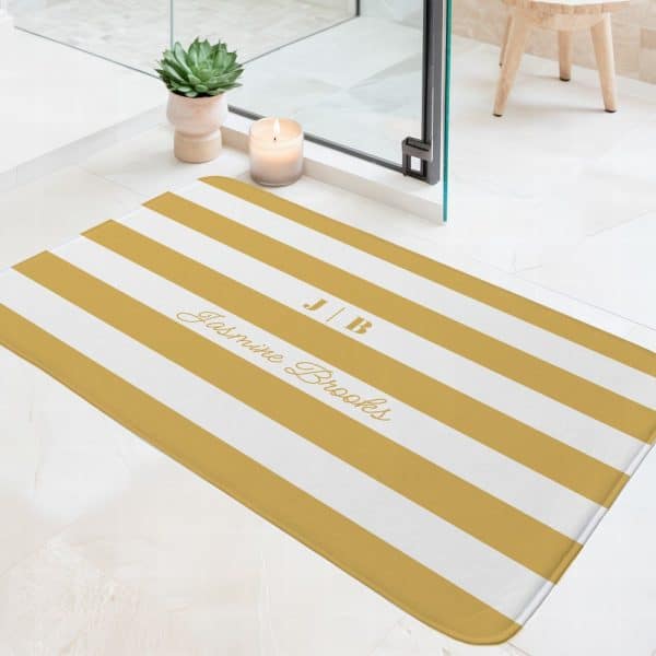 Mustard Yellow And White Striped Bath Mat With The Initials Jb And The Name Jasmine Brooks.