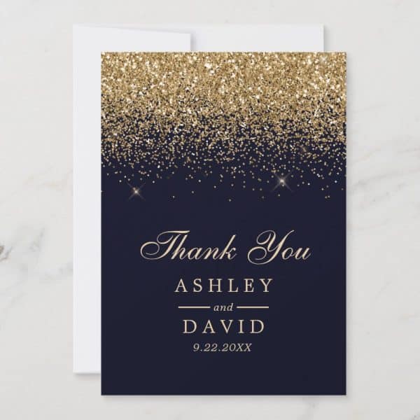 Gold Glitter On A Navy Blue Thank You Card From Ashley And David.
