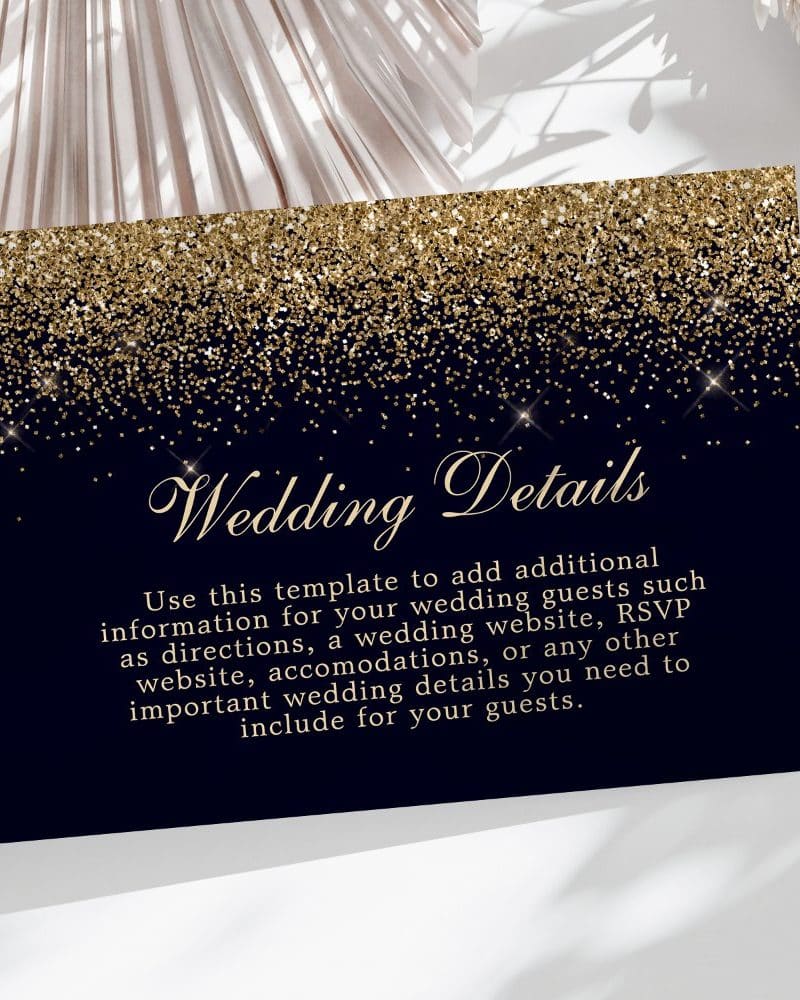 Navy blue wedding details card with gold glitter border and text.