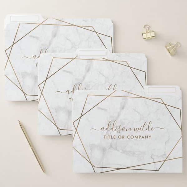 Three File Folders With A Marble And Gold Geometric Design. The Bottom Folder Is Labeled With A Name And Title.